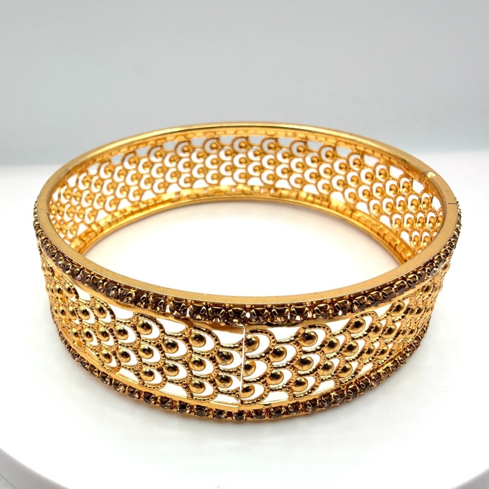 Vintage Gold Tone Clamper Bracelet with Rhinestone Filigree Design